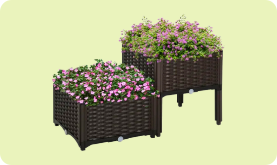 Two stackable, woven-pattern garden planters with blooming pink flowers, featuring a raised design for easy access.