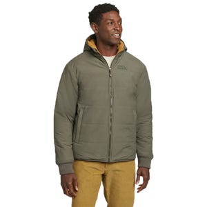 Eddie Bauer Reversible Jacket in olive green with a front zipper, ribbed cuffs, and pockets. The jacket features a contrasting brown lining, providing warmth and versatility.