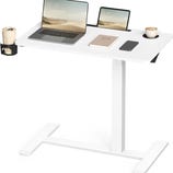 A white height-adjustable desk featuring a laptop, tablet, notebook, smartphone, coffee cup, and tumbler, providing an organized workspace with integrated cup holders.