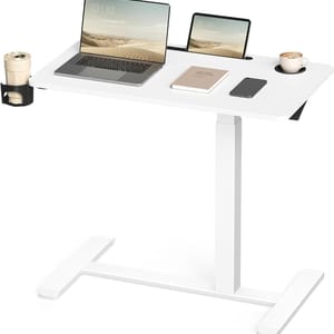 A white height-adjustable desk featuring a laptop, tablet, notebook, smartphone, coffee cup, and tumbler, providing an organized workspace with integrated cup holders.