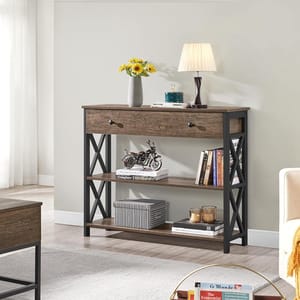 A wooden console table with two shelves, displaying decorative items such as a lamp, books, and a model motorcycle.