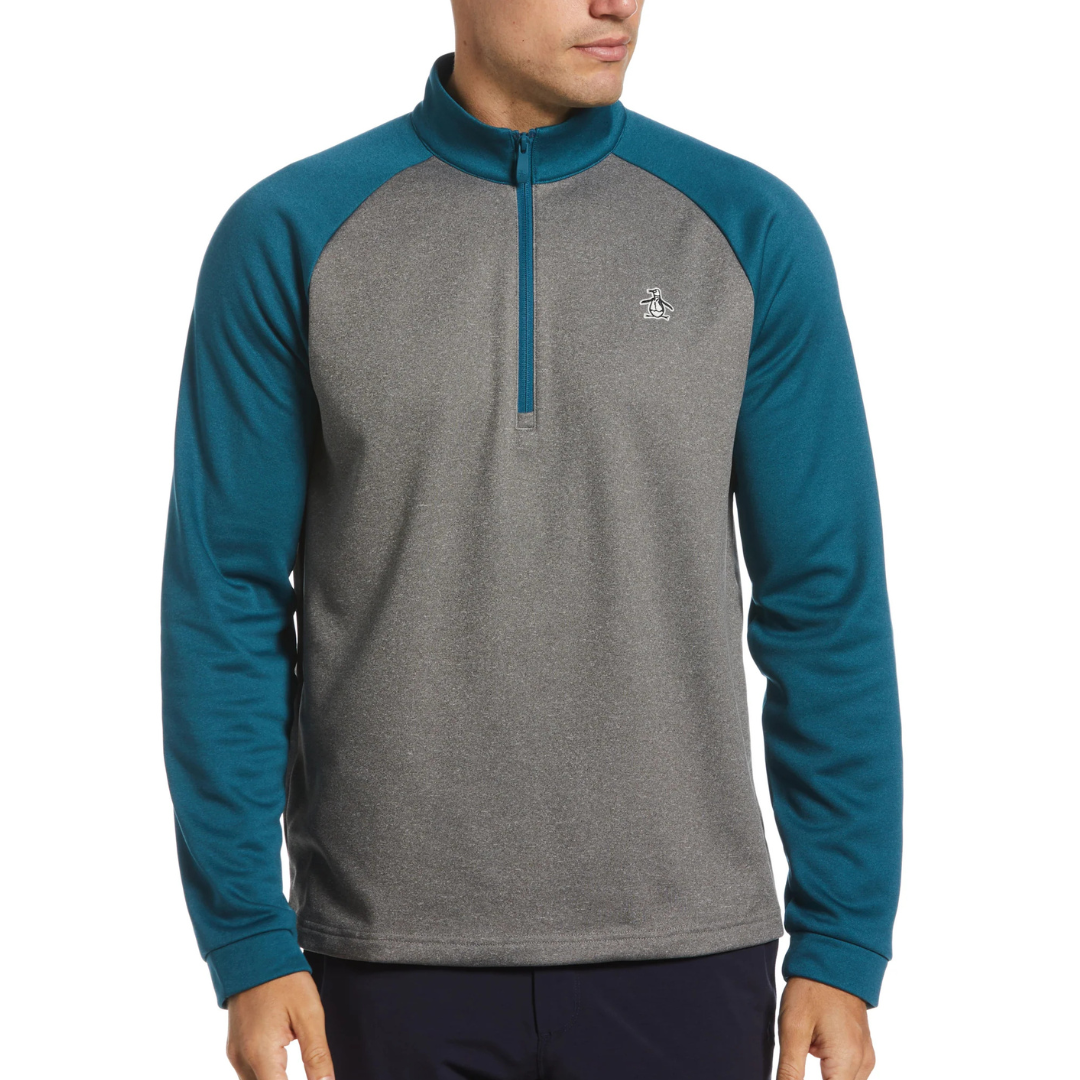 Men's two-tone quarter-zip pullover with a grey body and teal sleeves, featuring a small logo on the chest.