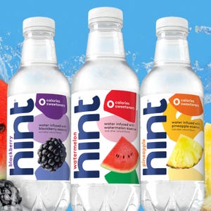 Three bottles of Hint flavored water in blackberry, watermelon, and pineapple varieties.