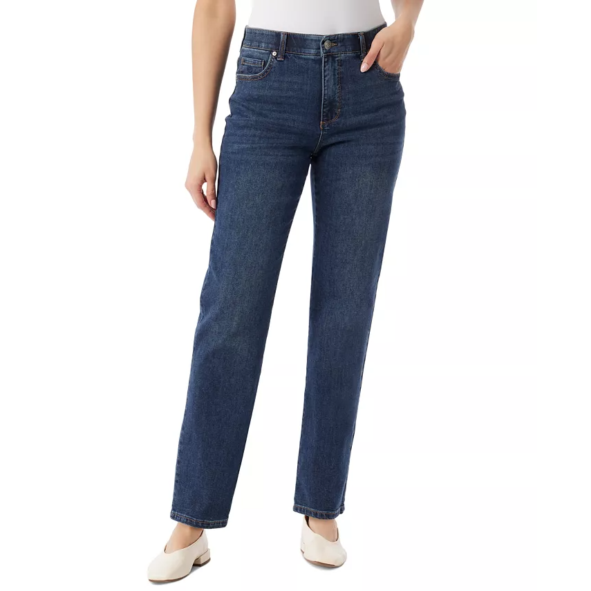 Dark blue, straight-leg jeans with a mid-rise waist and classic five-pocket design, paired with beige flats.