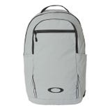 A light gray backpack with a front zippered pocket, side pockets, and a handle on top, featuring a black logo on the lower front.