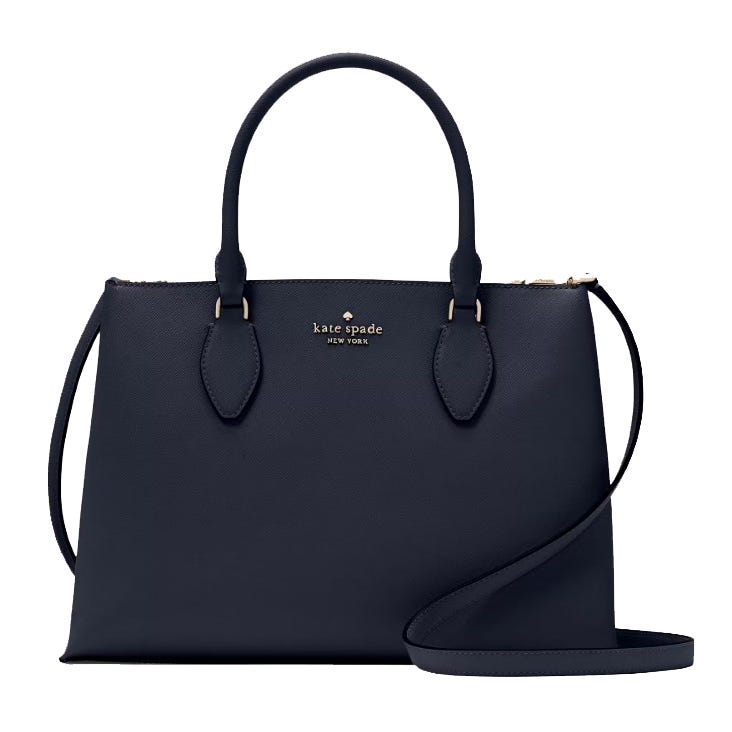 A navy Kate Spade New York handbag with dual handles and a detachable shoulder strap.