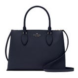 A navy Kate Spade New York handbag with dual handles and a detachable shoulder strap.