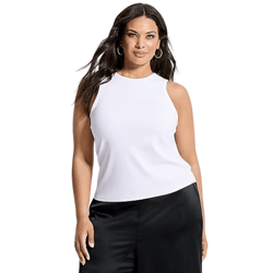 A woman wears a sleeveless white top and black pants, complemented by hoop earrings.