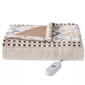 A folded electric blanket with a patterned design in beige and brown tones is shown, featuring a white remote control for adjusting heat settings.