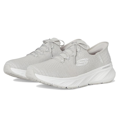 Skechers Hands Free Slip-In Shoes feature a sleek, light gray knit mesh upper with a lace-up design, a high-traction outsole, and a comfortable cushioned midsole for easy slip-on convenience and support.