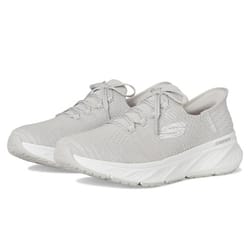Skechers Hands Free Slip-In Shoes feature a sleek, light gray knit mesh upper with a lace-up design, a high-traction outsole, and a comfortable cushioned midsole for easy slip-on convenience and support.