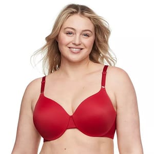 A woman is wearing a red bra with adjustable straps.