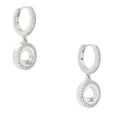 These are silver hoop earrings with a circle and spade-shaped design, embellished with small, sparkling stones. They are called \“Spot The Spade Pave Huggies\“ and have a modern, elegant appearance.