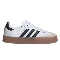 White and black Adidas Samba sneaker with a brown gum sole and three signature black stripes on the side.