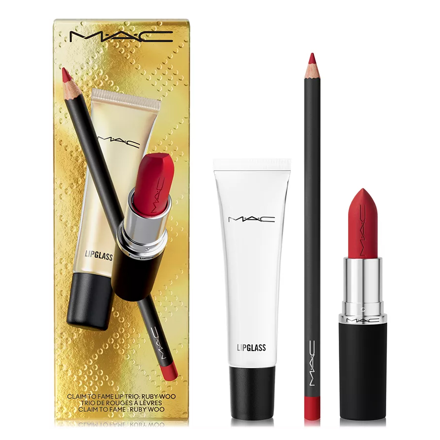 The 3pc MAC Claim to Fame Lip Set includes a red lipstick, a matching red lip pencil, and a clear lipglass. These items are presented in gold packaging.