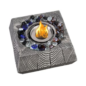 9\“ portable tabletop fire pit with a geometric base, features a central stainless steel burner surrounded by decorative glass stones in various colors. Designed for indoor or outdoor ambiance.