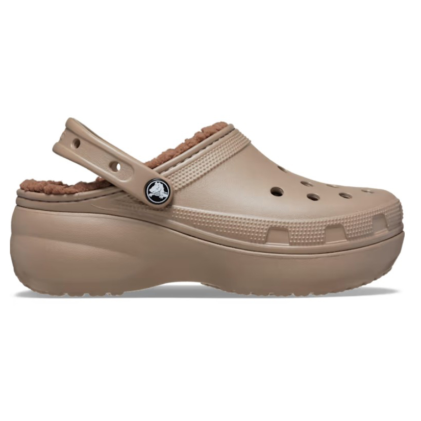 Beige Crocs Classic Platform Lined Clogs with a plush, warm lining, elevated platform sole, adjustable heel strap, and ventilation holes on the top.