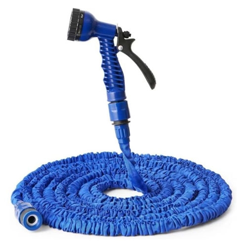 A blue expandable garden hose with a spray nozzle attached.