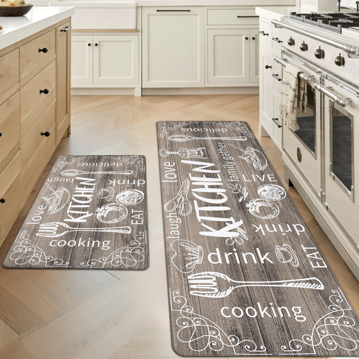Two kitchen floor mats with a rustic wooden design feature words like \“KITCHEN,\“ \“love,\“ \“drink,\“ and \“eat,\“ along with illustrations of utensils and food.