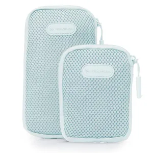 Two light blue mesh accessory pods with zippers, featuring the Travelon logo. They come in a larger and a smaller size, designed for organizing travel items.