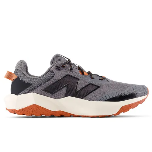 A gray and orange trail running shoe with a rugged sole, featuring a prominent brand logo on the side and an orange pull tab at the heel.