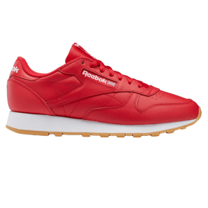 Red Reebok Classic Leather sneaker with a white midsole and gum outsole, featuring the Reebok logo and Union Jack flag on the side.