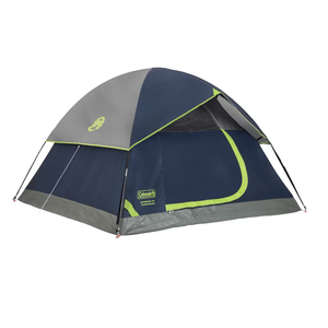 A dome-shaped Coleman camping tent with a blue and gray color scheme, featuring a front door with yellow-green trim and a rainfly.