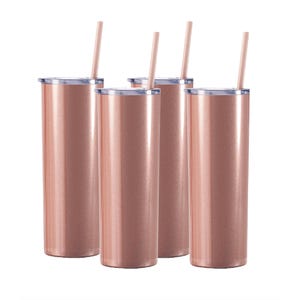 Set of four rose gold, 20oz stainless steel insulated tumblers with clear lids and matching straws, designed for hot or cold beverages.