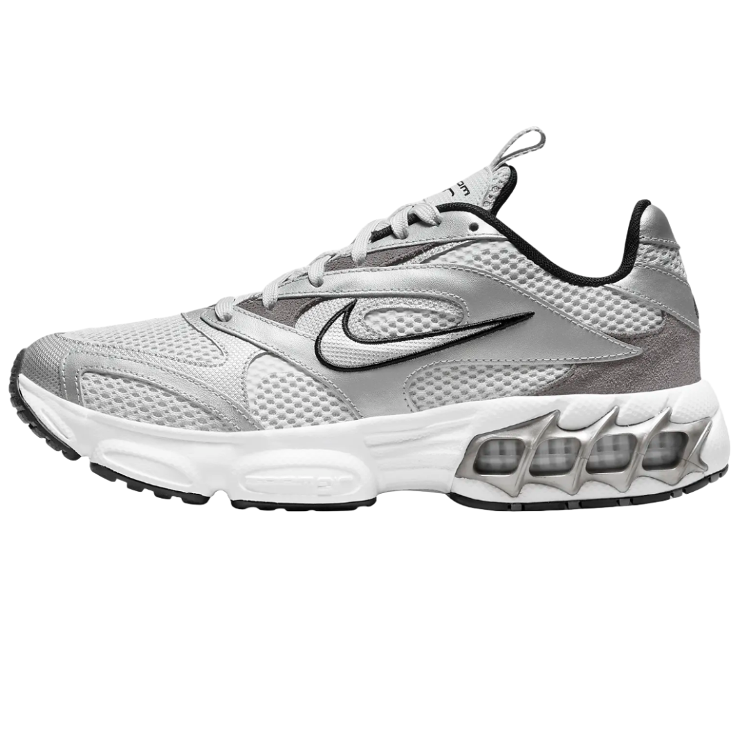 Nike Zoom Air Fire Shoes feature a mesh and leather upper in silver and white, with a black outlined swoosh, and a distinctive Air cushioning unit visible in the midsole for enhanced support and comfort.