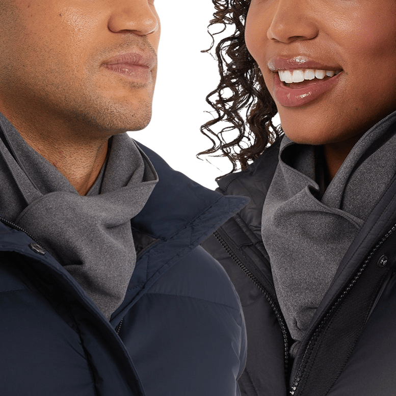 Two people are wearing dark puffer jackets and grey scarves. Both jackets are zippered, with one navy and the other black, showcasing a cozy and coordinated winter look.