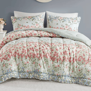 A floral 3-piece comforter set featuring a comforter and two pillow shams with a pattern of pink and blue flowers on a light background, designed to add a touch of elegance to any bedroom.