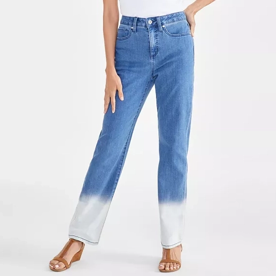 A pair of women's high-rise straight-leg jeans featuring a dip-dye effect transitioning from blue to white at the ankles. The jeans are paired with strappy sandals.