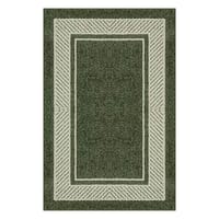 A green rectangular throw rug with a lighter border and a diamond-patterned edge.