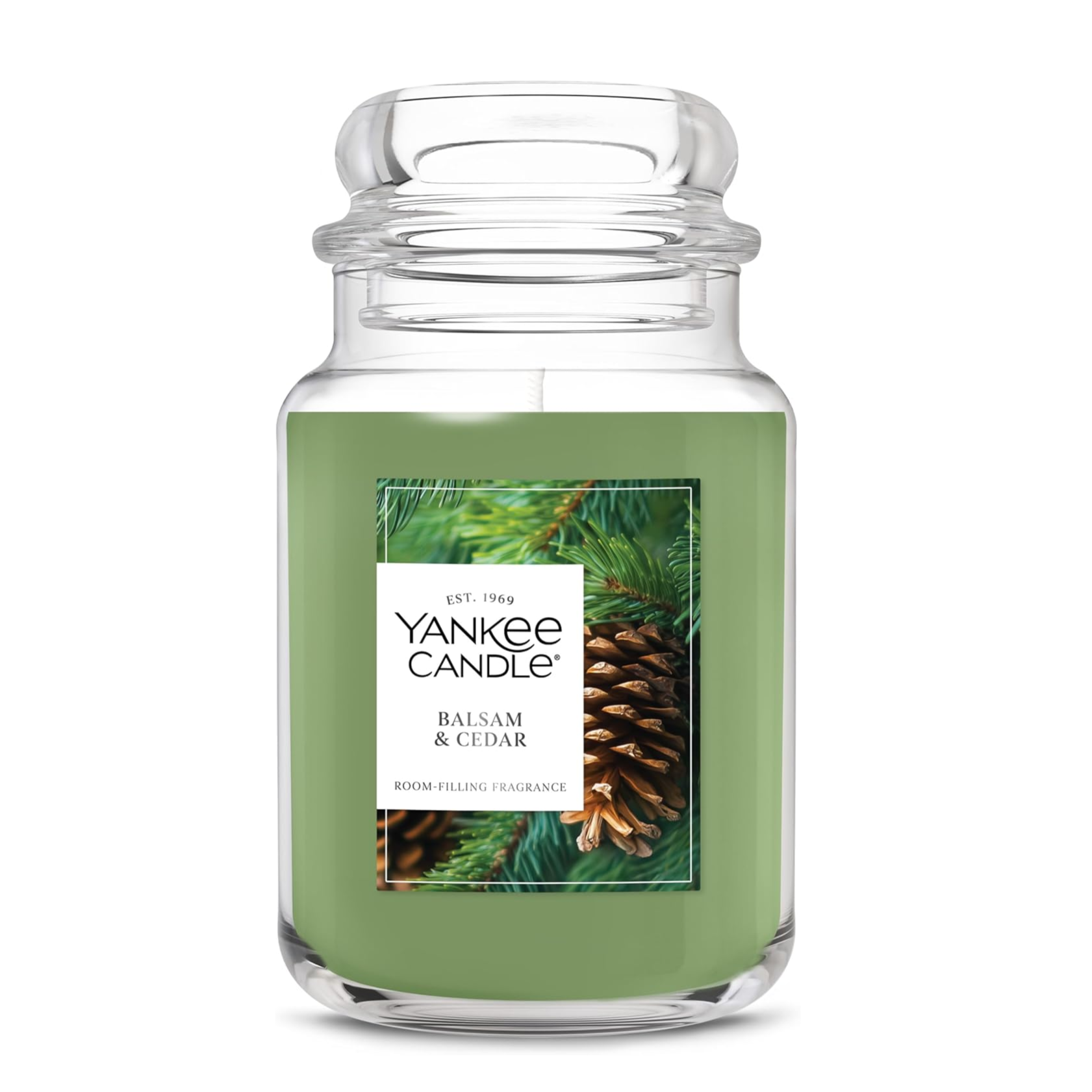 Yankee Candle Balsam & Cedar scented candle with a green wax, featuring a pine and cedar fragrance.