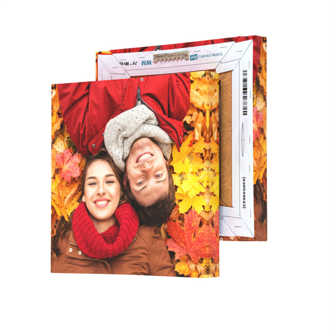 An 8\“ x 8\“ canvas print features a photo of two people smiling with a background of autumn leaves; it is displayed beside its shipping package.