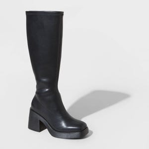 Black knee-high boot with a chunky high heel.