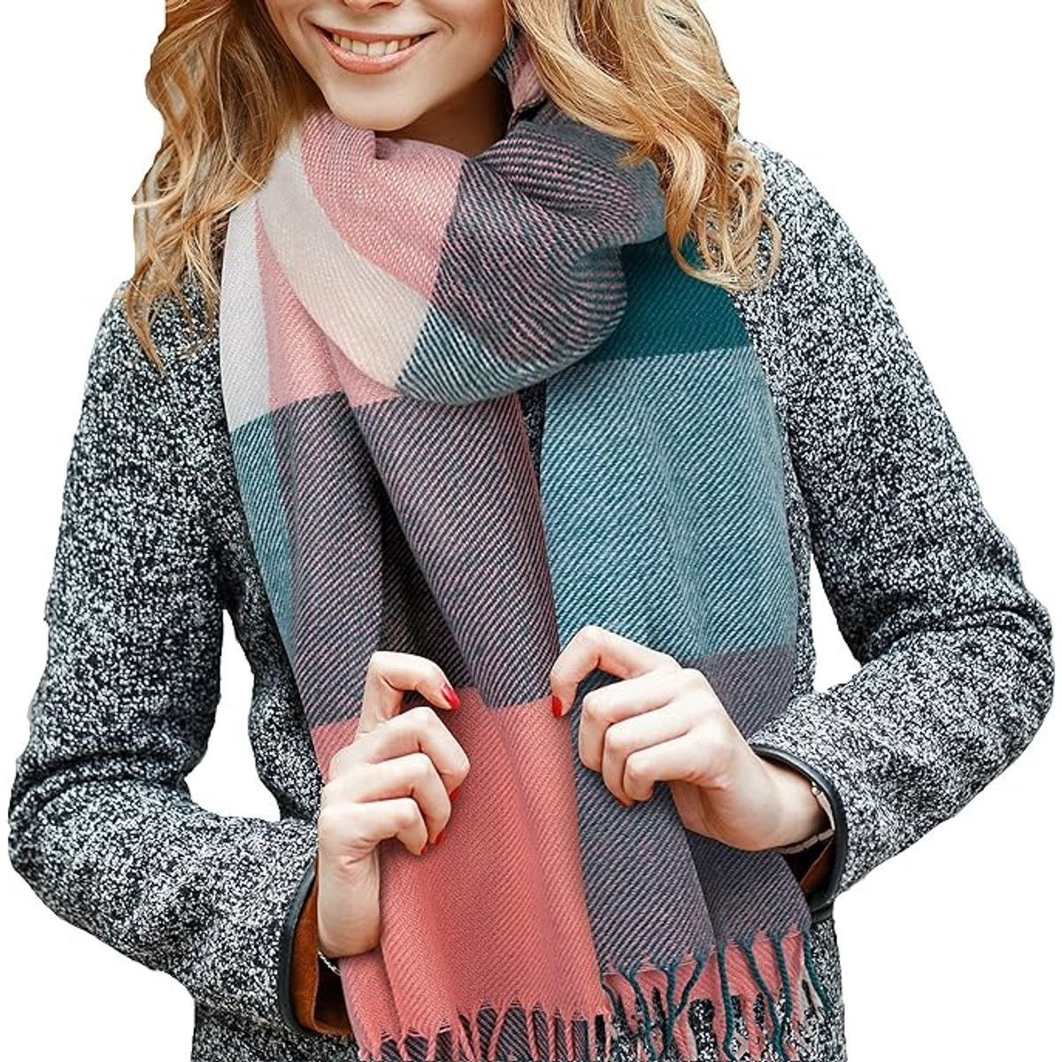 A person is wearing a multicolored, checkered scarf with fringe ends over a textured grey coat.