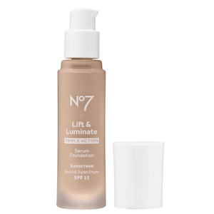 No7 Lift & Luminate Triple Action Serum Foundation with SPF 15 in a pump bottle with the cap removed, offering broad-spectrum sunscreen protection.