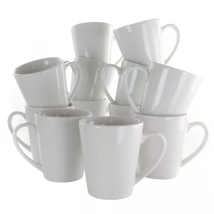 A stack of plain white ceramic mugs.