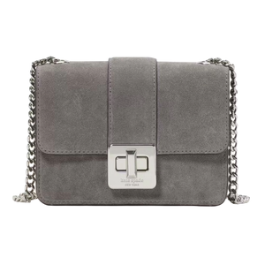 A gray suede crossbody bag with a chain strap and a front flap closure featuring a silver turn-lock clasp.