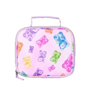 A lunchbox with a light purple border features colorful gummy bear illustrations in various sizes on a pink background.