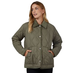 A woman wearing an olive-green quilted jacket with a button-up front and front pockets.