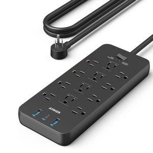 A black Anker power strip with six AC outlets and three USB ports, including two USB-A and one USB-C, designed for surge and grounded protection.