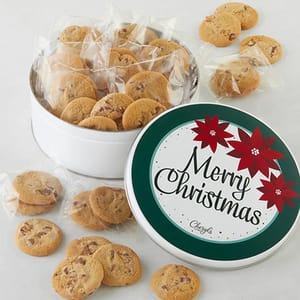 A round tin featuring a \“Merry Christmas\“ design contains 32 individually wrapped cookies, displayed both inside and surrounding the tin. The lid of the tin is festively decorated with red poinsettias.