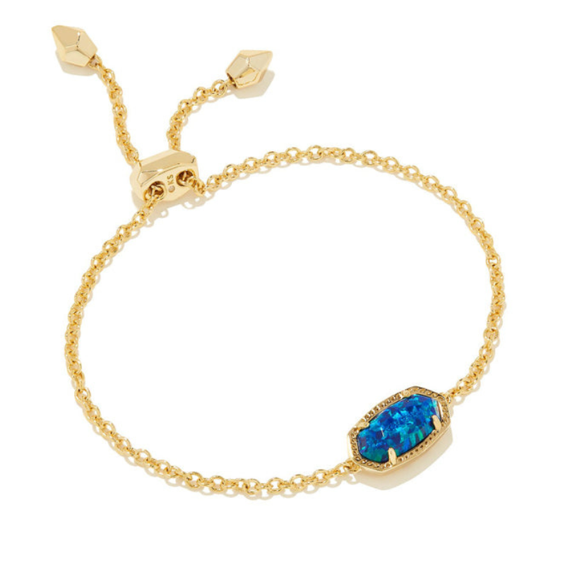 A gold chain bracelet featuring an adjustable sliding closure and a rectangular blue birthstone set in a delicate gold bezel.