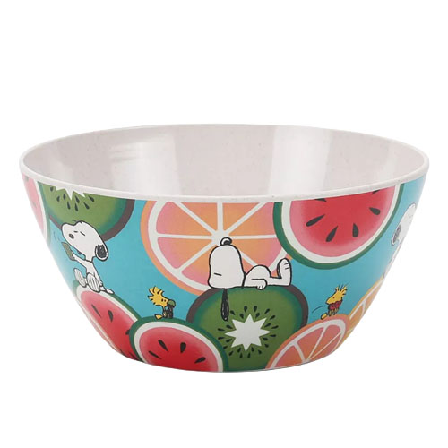 A colorful bowl featuring cartoon characters and vibrant fruit designs, including watermelons, kiwis, and citrus slices.
