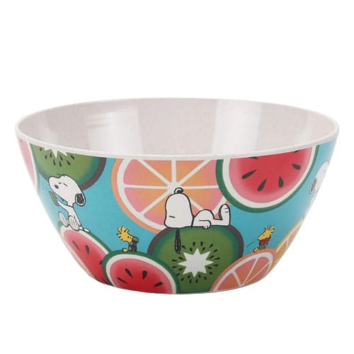 A colorful bowl featuring cartoon characters and vibrant fruit designs, including watermelons, kiwis, and citrus slices.