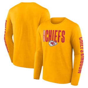 Yellow long-sleeve shirt with \“CHIEFS\“ text, Kansas City Chiefs logo on the front, and \“CHIEFS KINGDOM\“ text on the right sleeve.