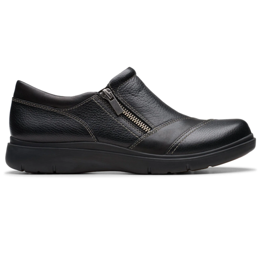 Black leather slip-on shoe with side zipper, decorative stitching, and a cushioned sole for comfort.
