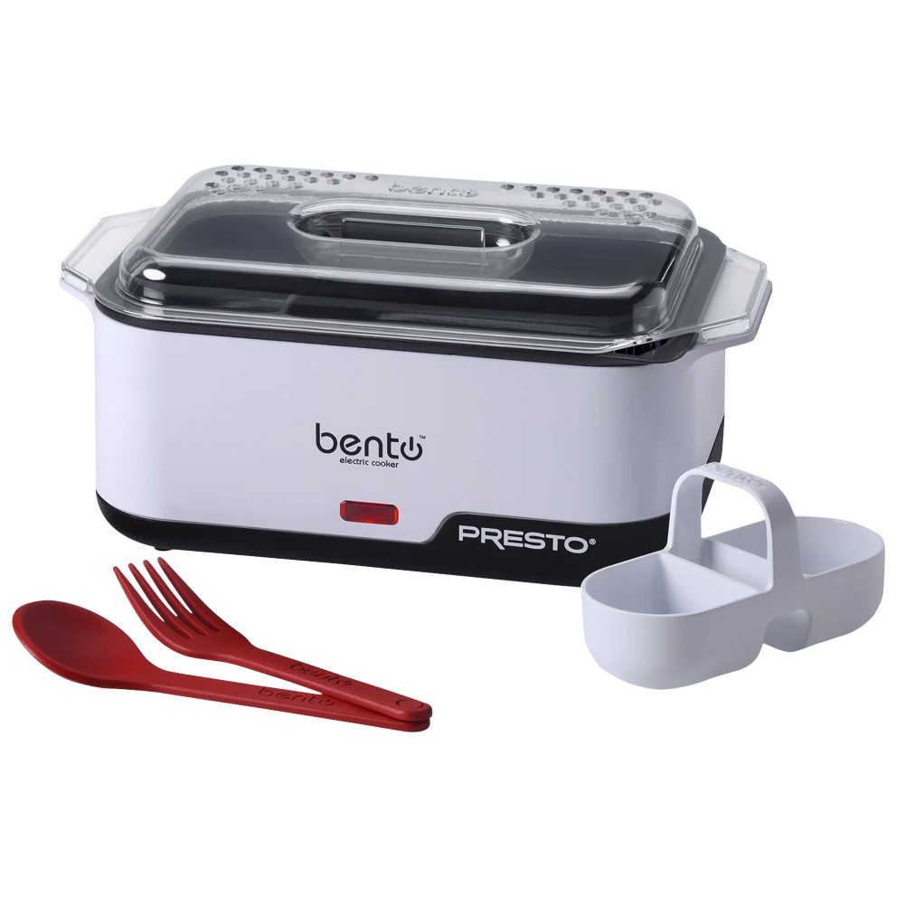 A compact electric bento cooker with a clear lid, accompanied by a red fork and spoon set, and a white food separator.